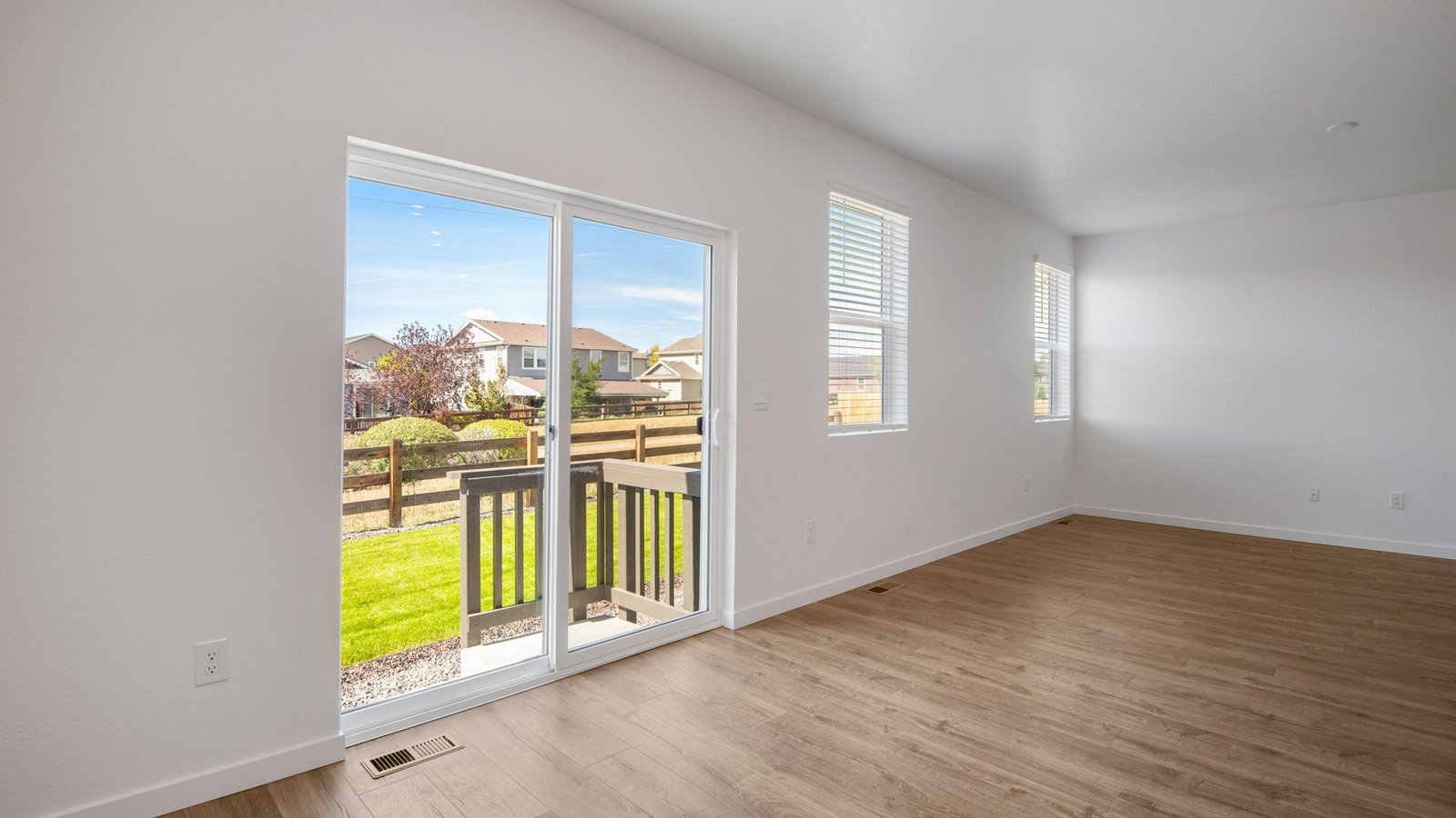 Living room backing to open space in new home