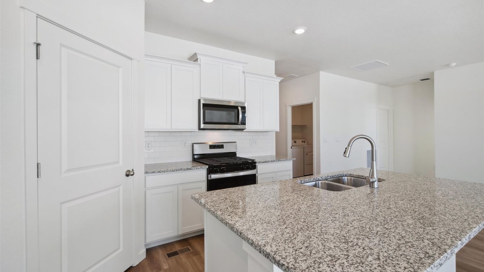 Spacious kitchen island perfect for entertaining in new home near Elizabeth Colorado