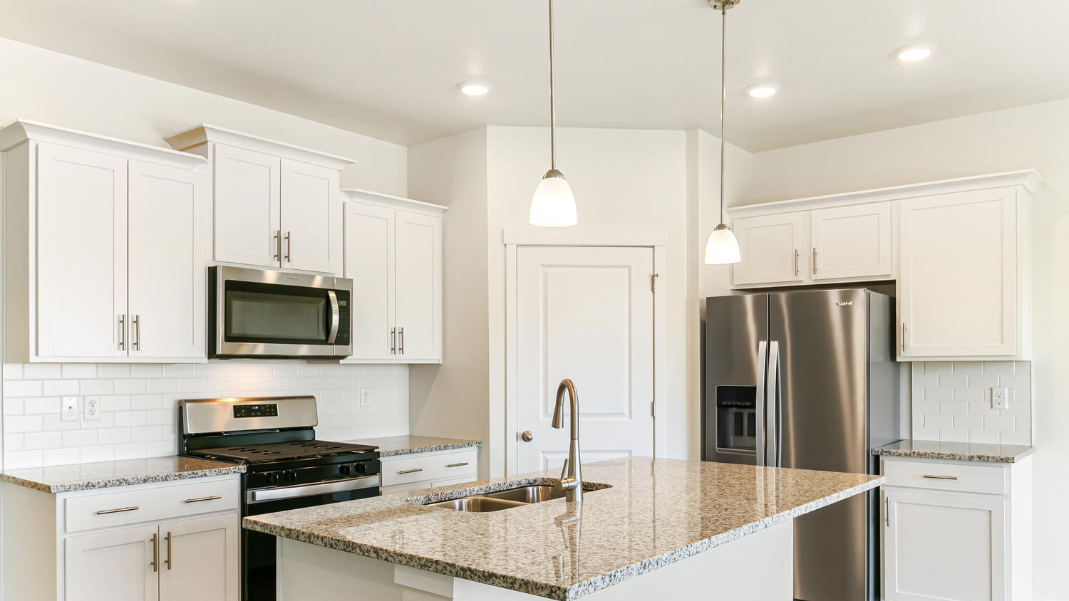 LED and pendant lighting above kitchen island