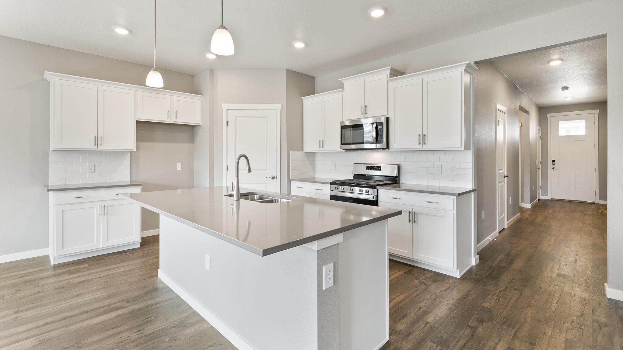 kitchen with white cabinets in new construction home