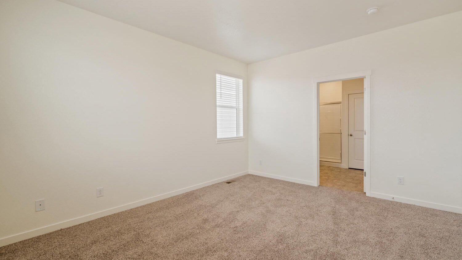 Primary bedroom suite with private bath