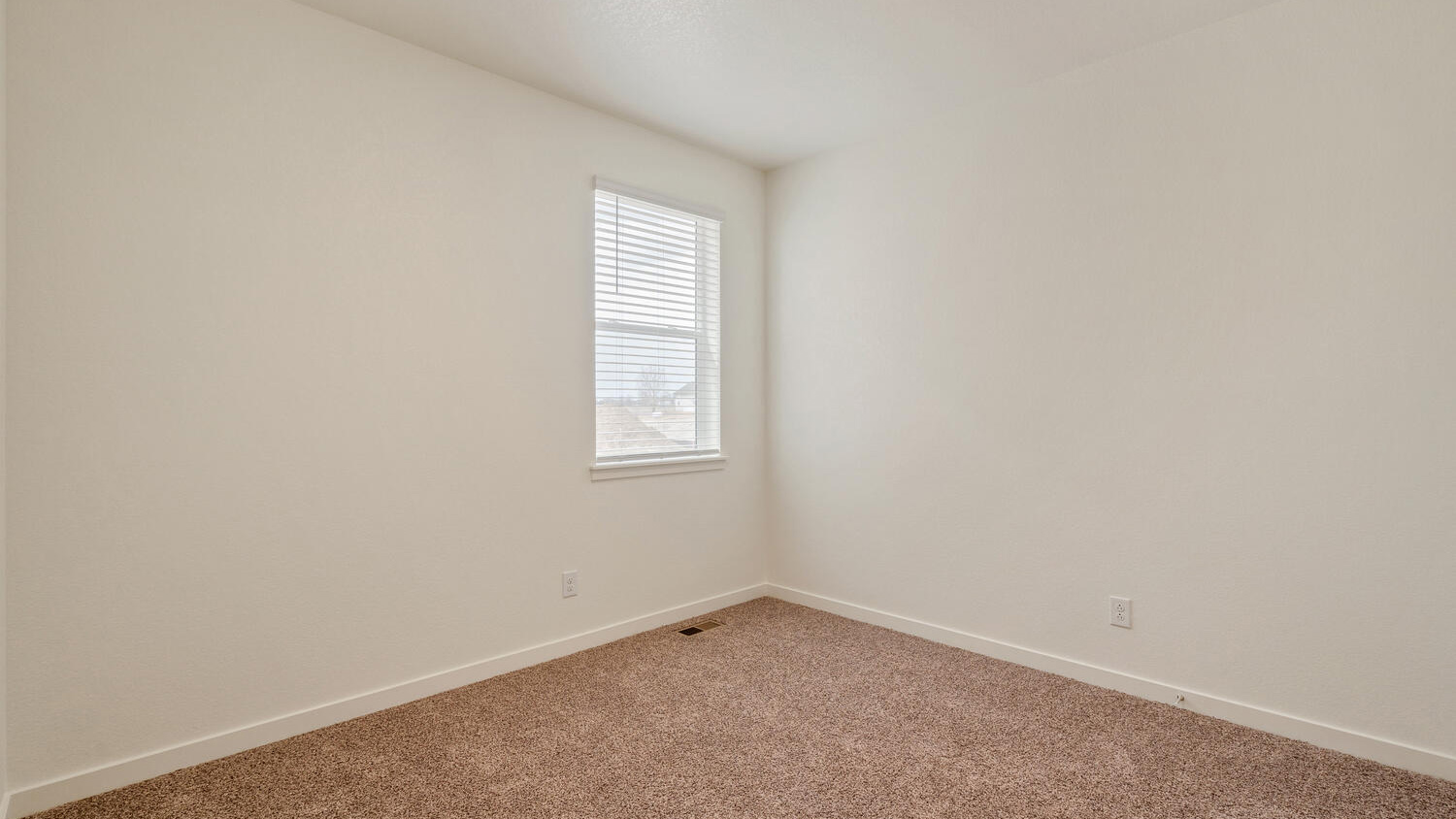 Plush carpeting in secondary bedroom