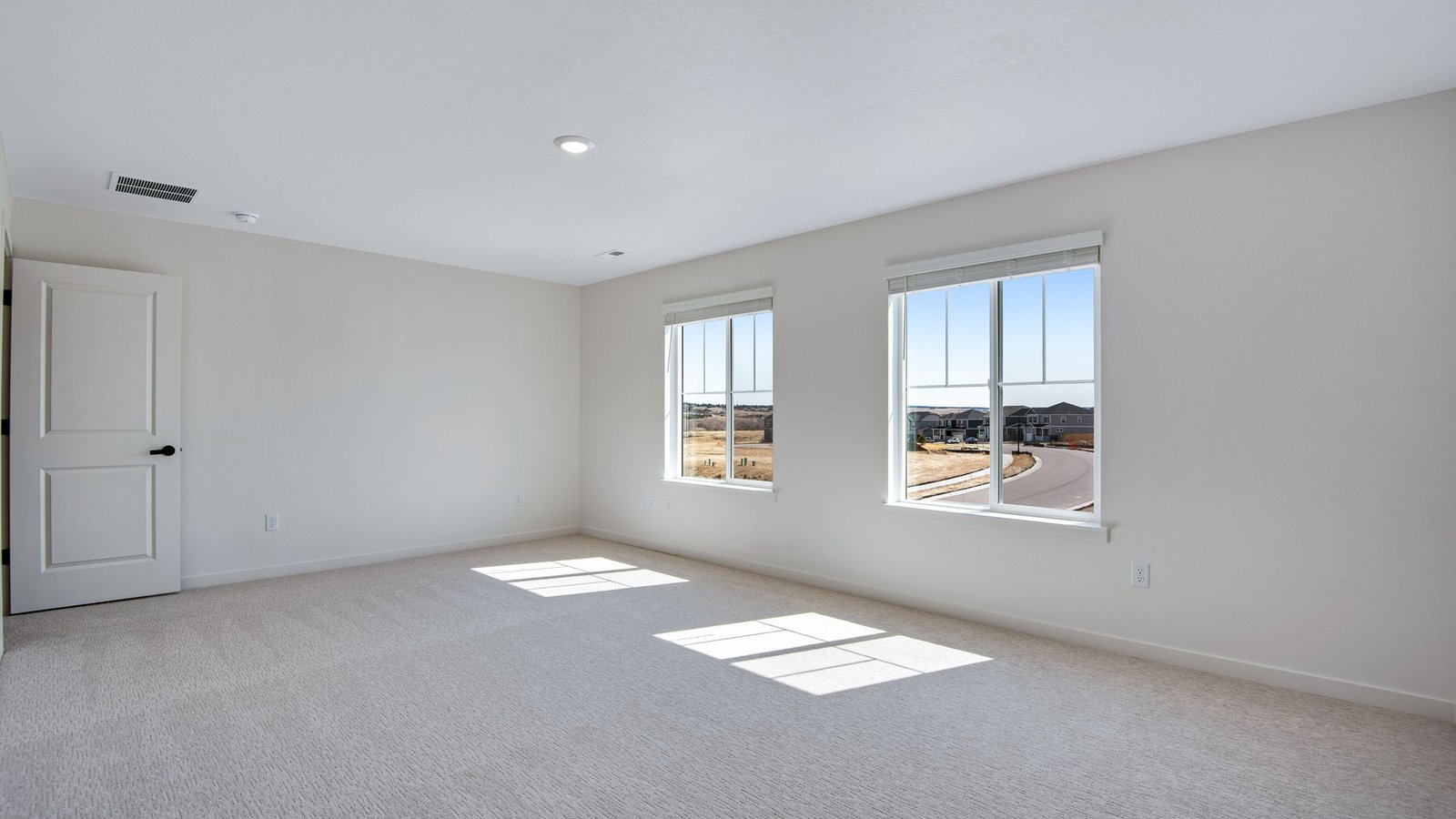 spacious primary bedroom in new spring valley ranch home elizabeth, co