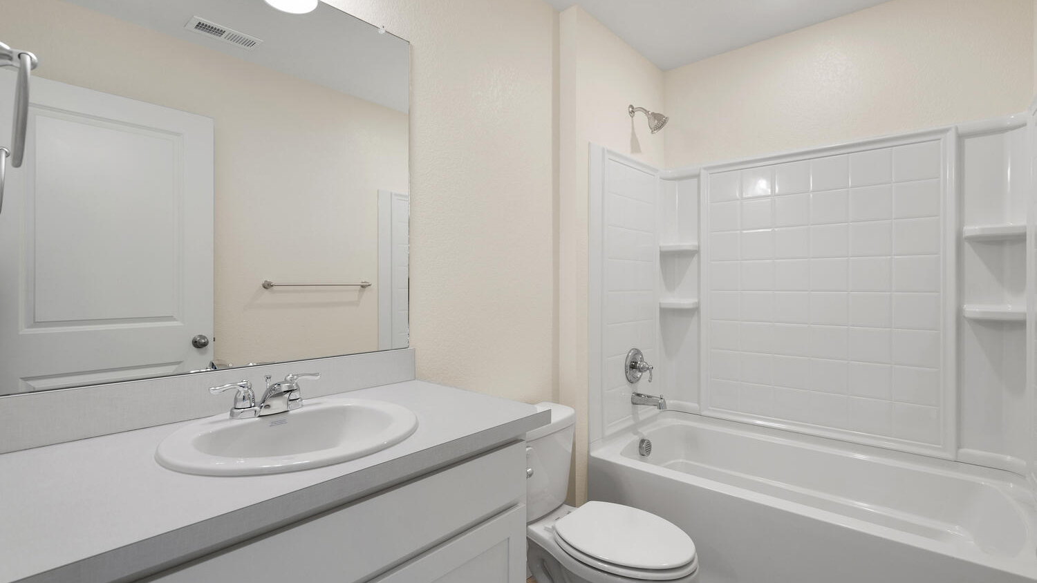 Additional upstairs bathroom with shower/tub combo and chrome fixutures