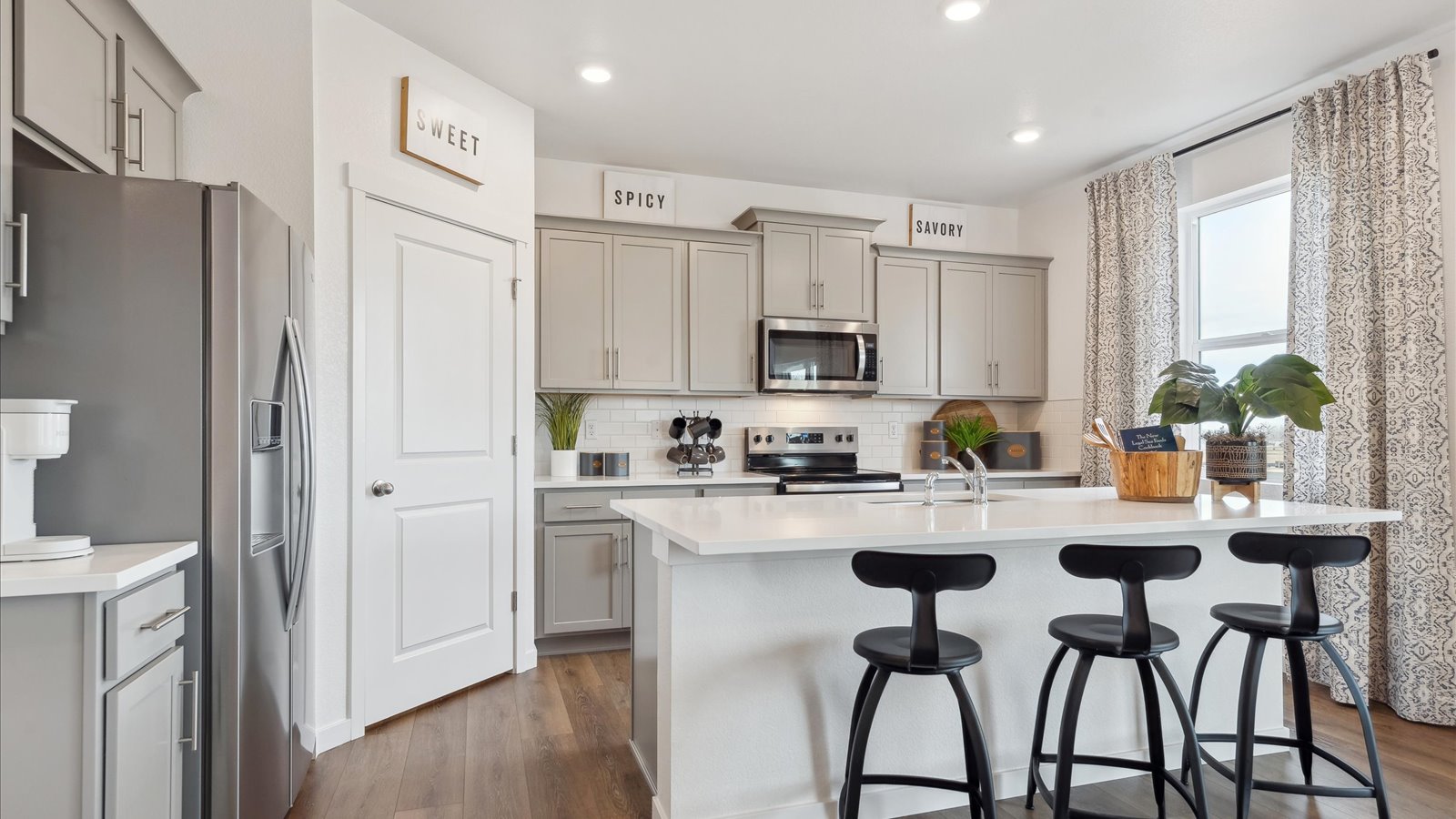 Kitchen with corner pantry in new construction home