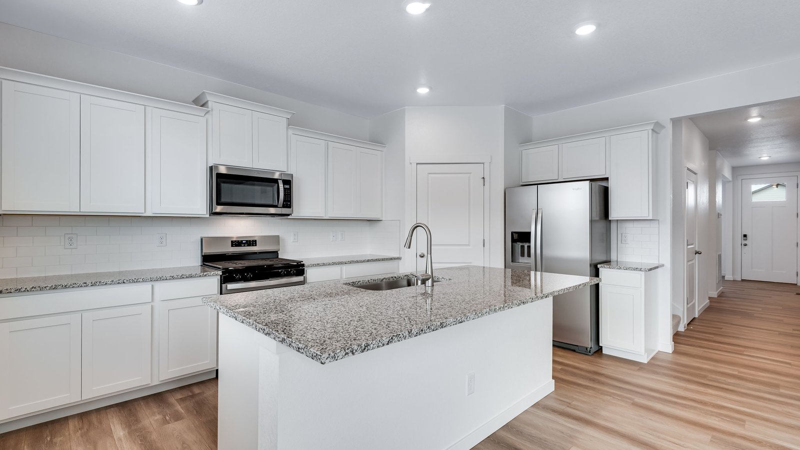 Modern kitchen with white cabinets
