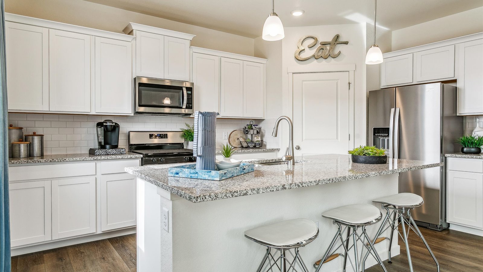 Modern kitchen with white cabinets
