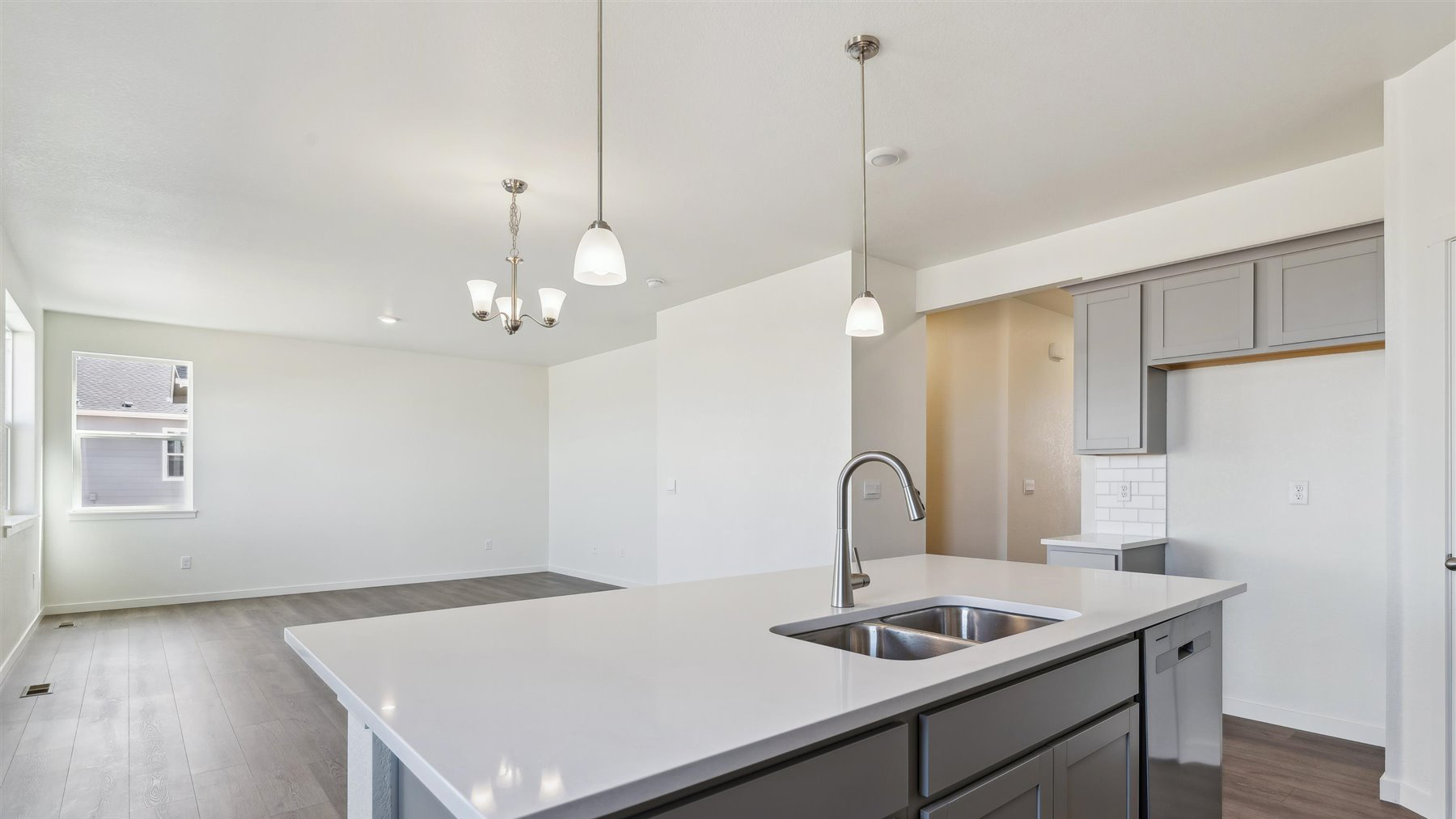 Spacious kitchen island perfect for entertaining in new home at Spring Valley Ranch Community