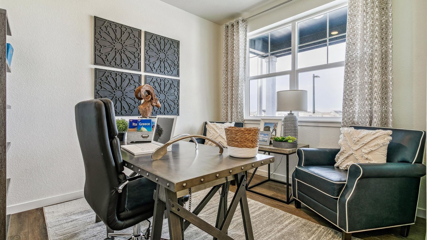 Study room located near home entrance with large window