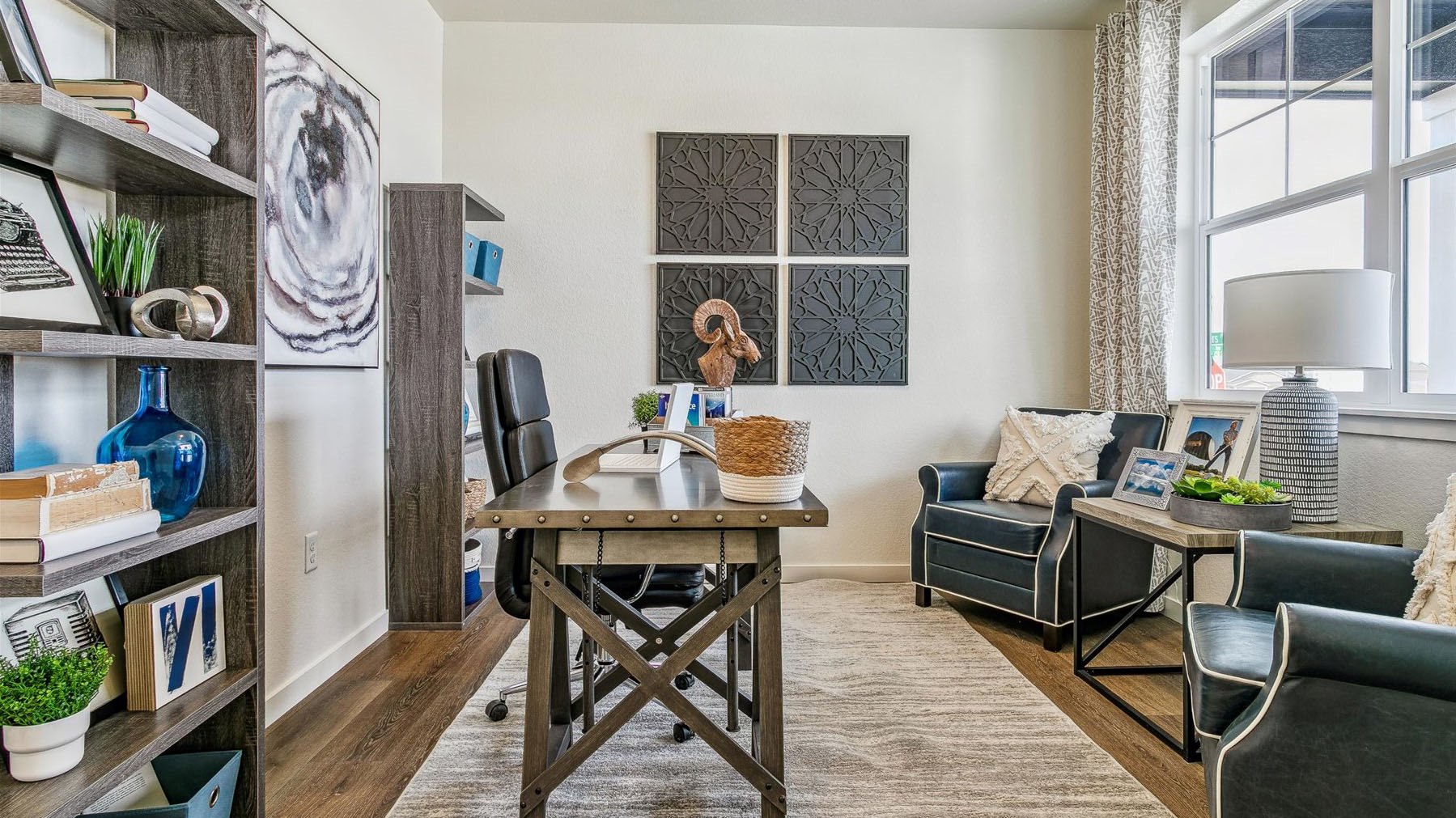 Another view of study with ample natural lighting open to foyer