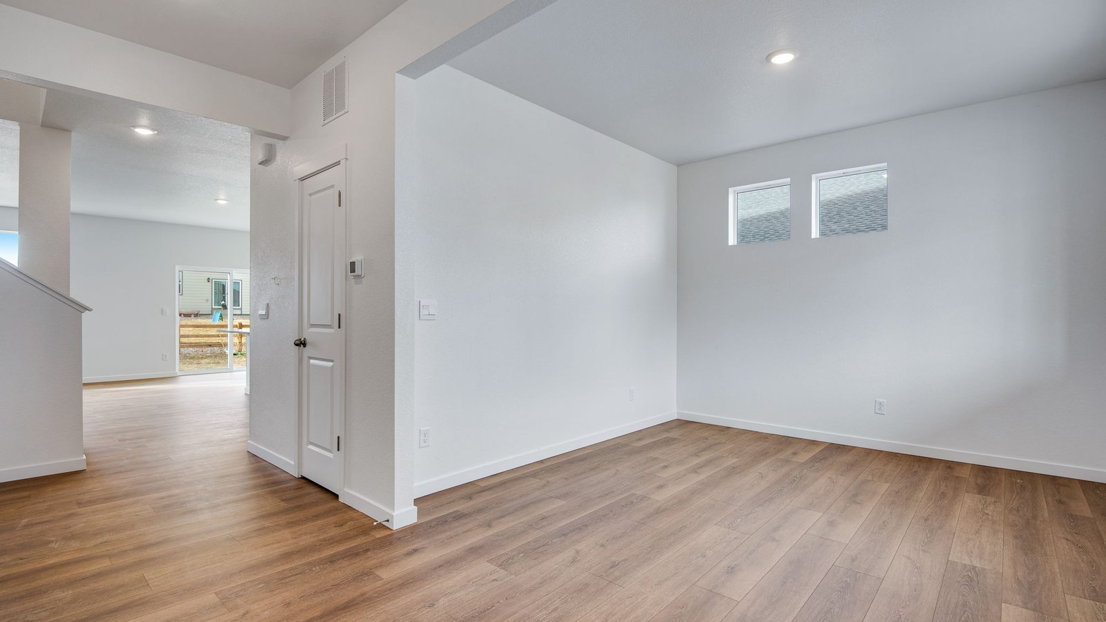 Welcoming entryway with versatile room options