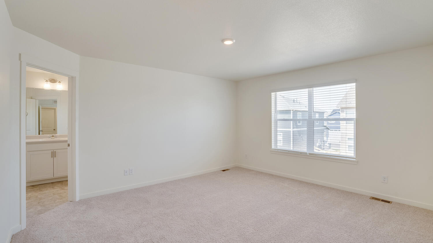 large primary bedroom in new home