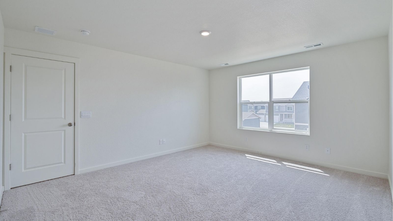 large primary bedroom in new home