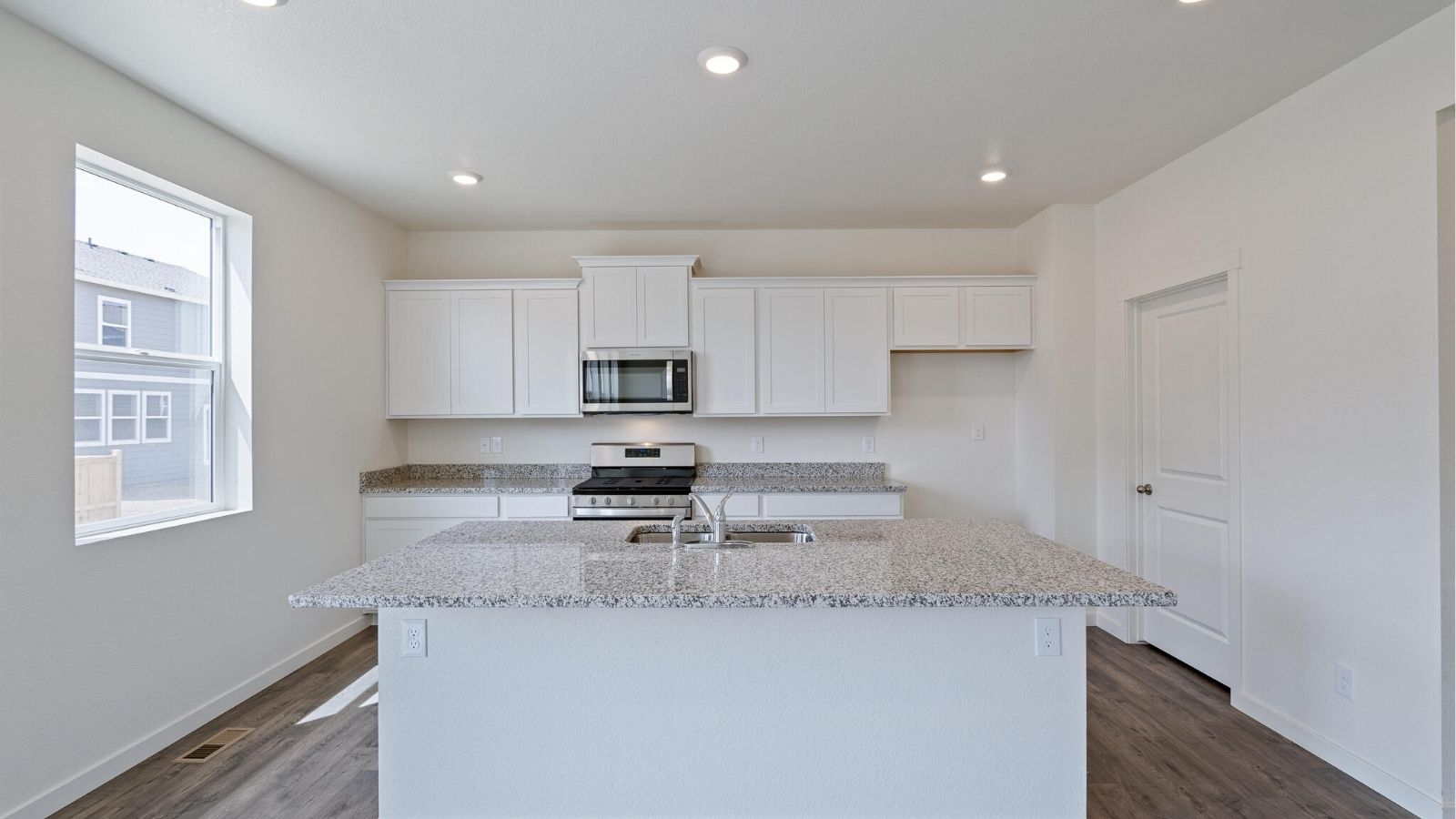 kitchen with island in new home