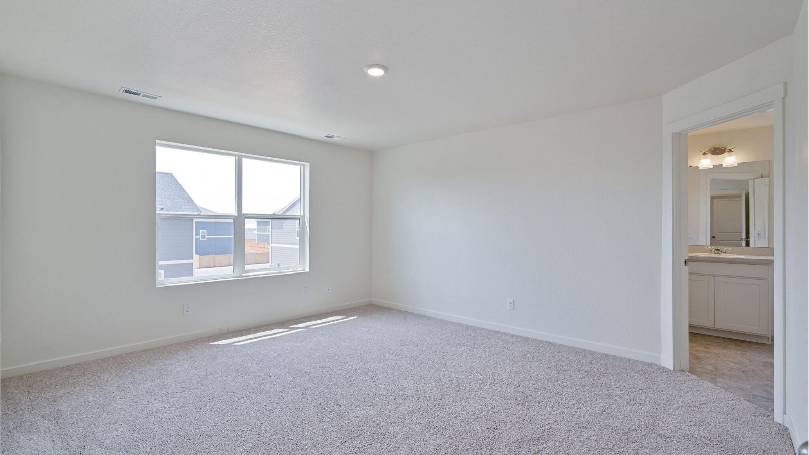new home with large primary bedroom