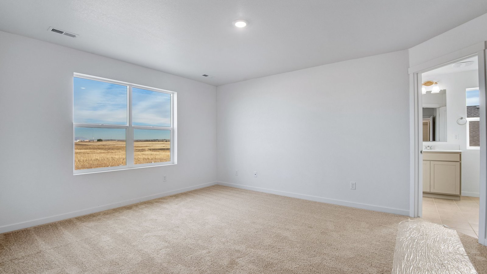 Spacious primary bedroom in new D.R. Horton home in Elizabeth, Colorado