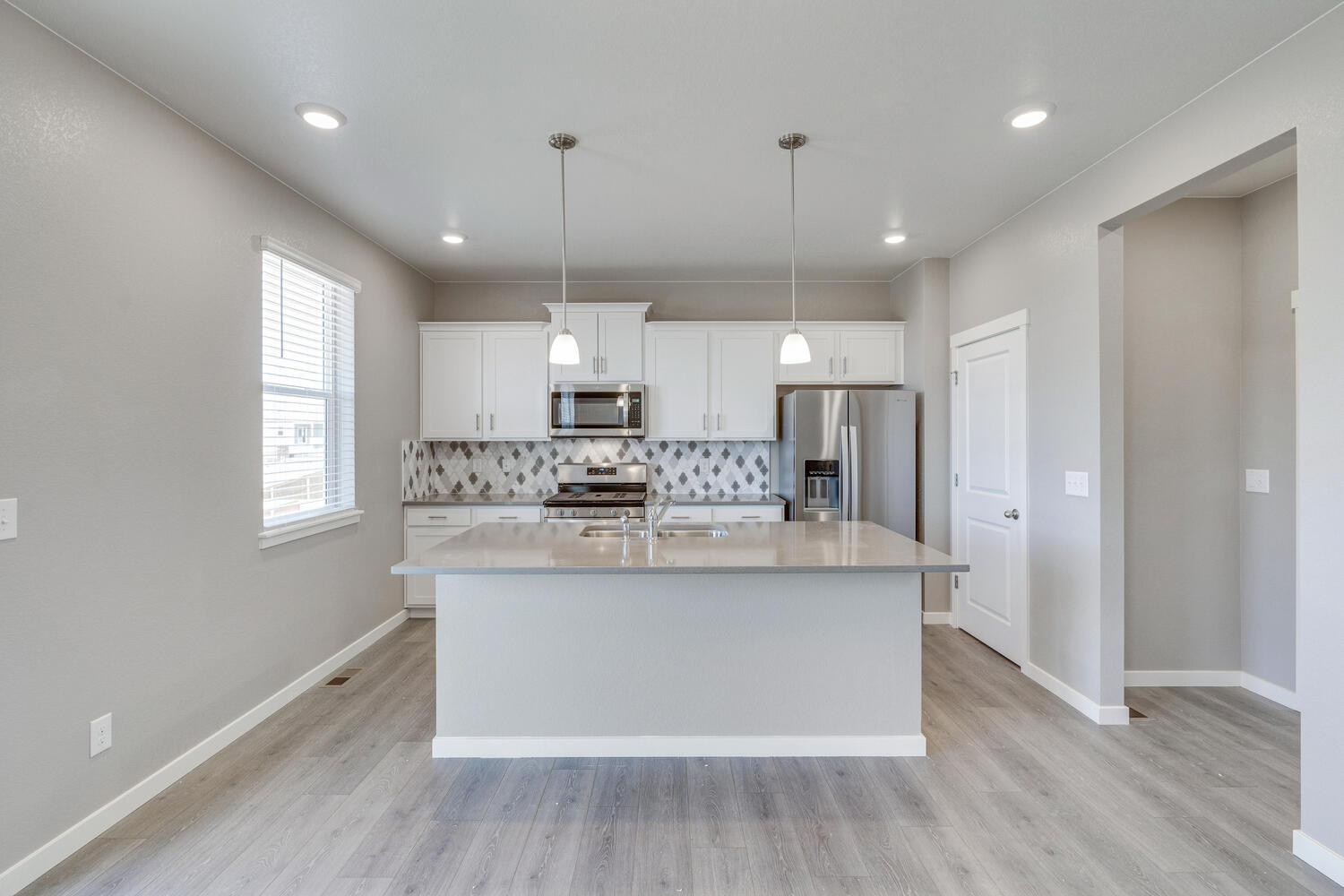 View of kitchen with pantry and entrance to garage available