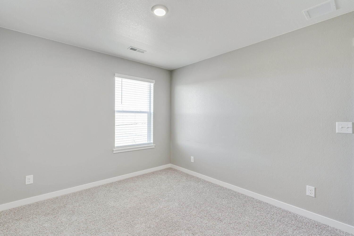 Bedroom 3 with backyard-facing second-story window and multiple outlets