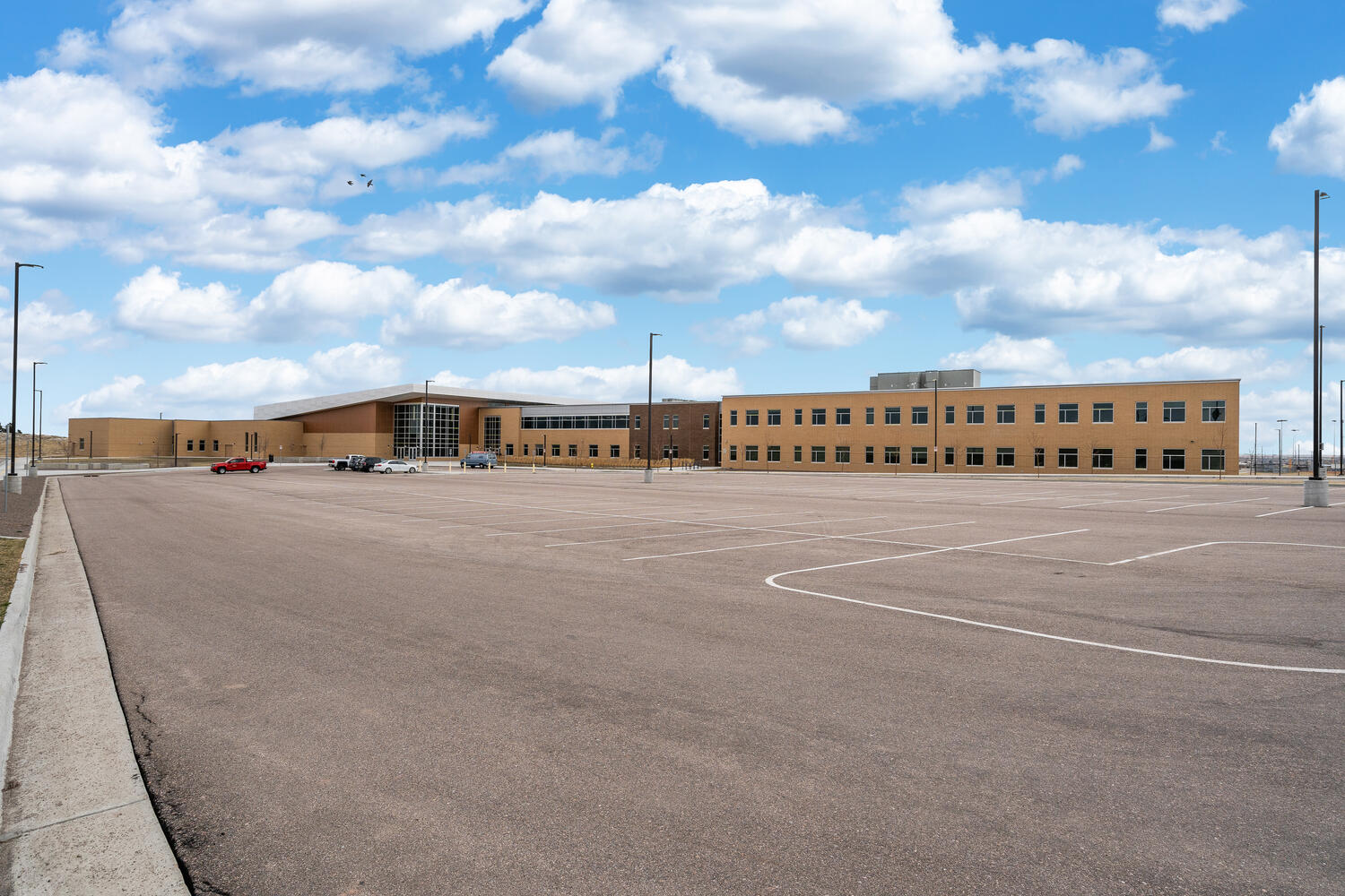Alternate view of high school from large parking lot