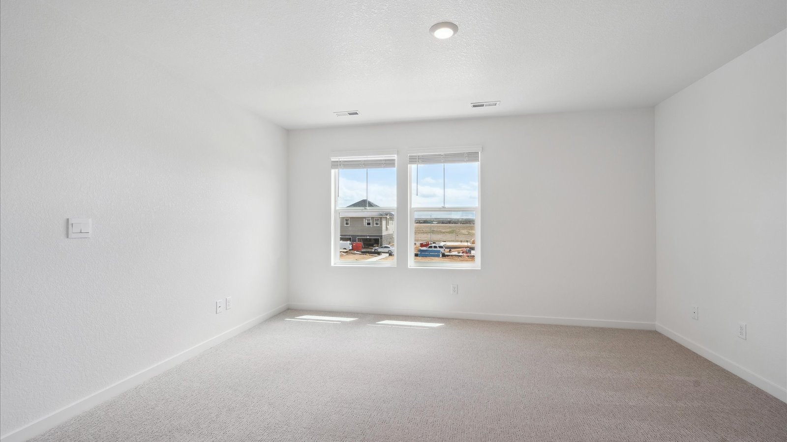 Primary bedroom in new home in colorado