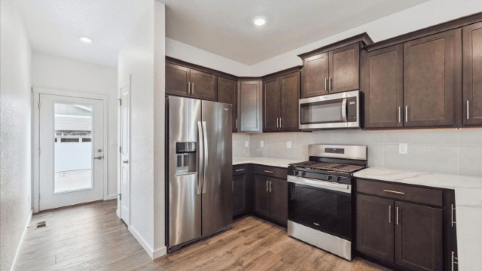 Kitchen with new finishes in home at Horizon Uptown