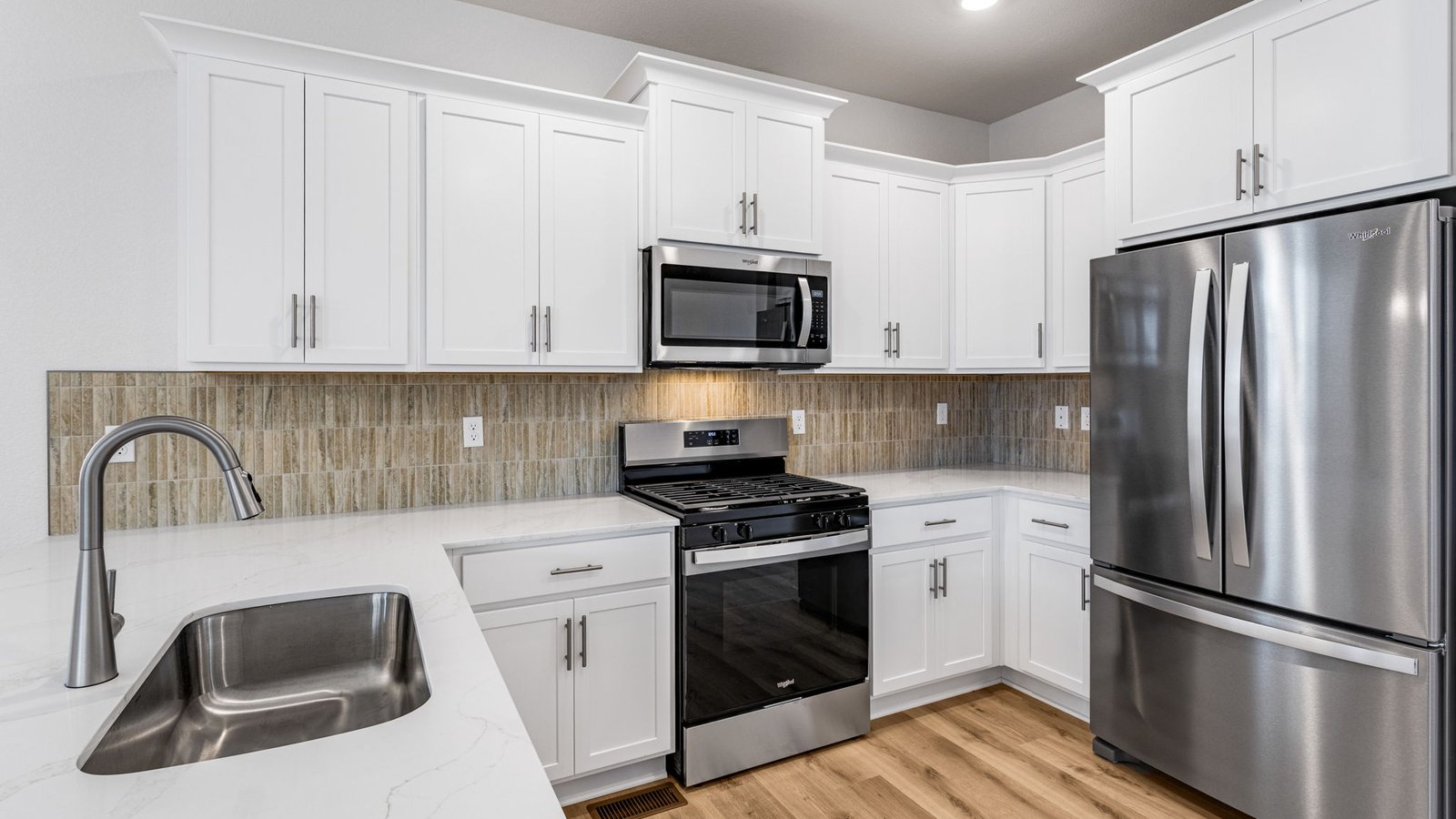 Stainless steel appliances in new home at Horizon Uptown community in Aurora Colorado