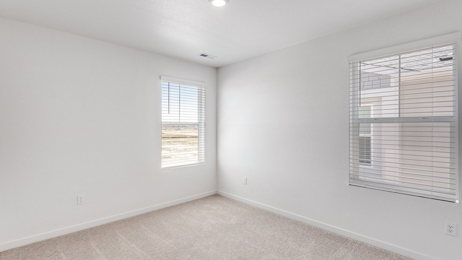 Secondary bedroom in new home at Horizon Uptown community in Aurora Colorado