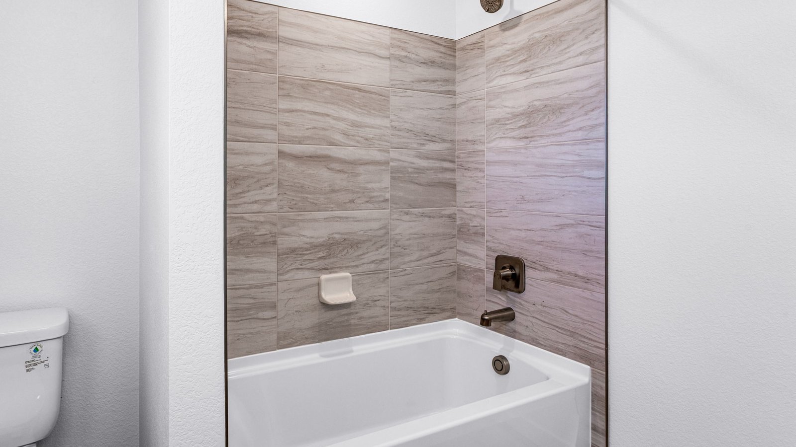secondary bathroom in new home at Horizon Uptown community in Aurora, Colorado