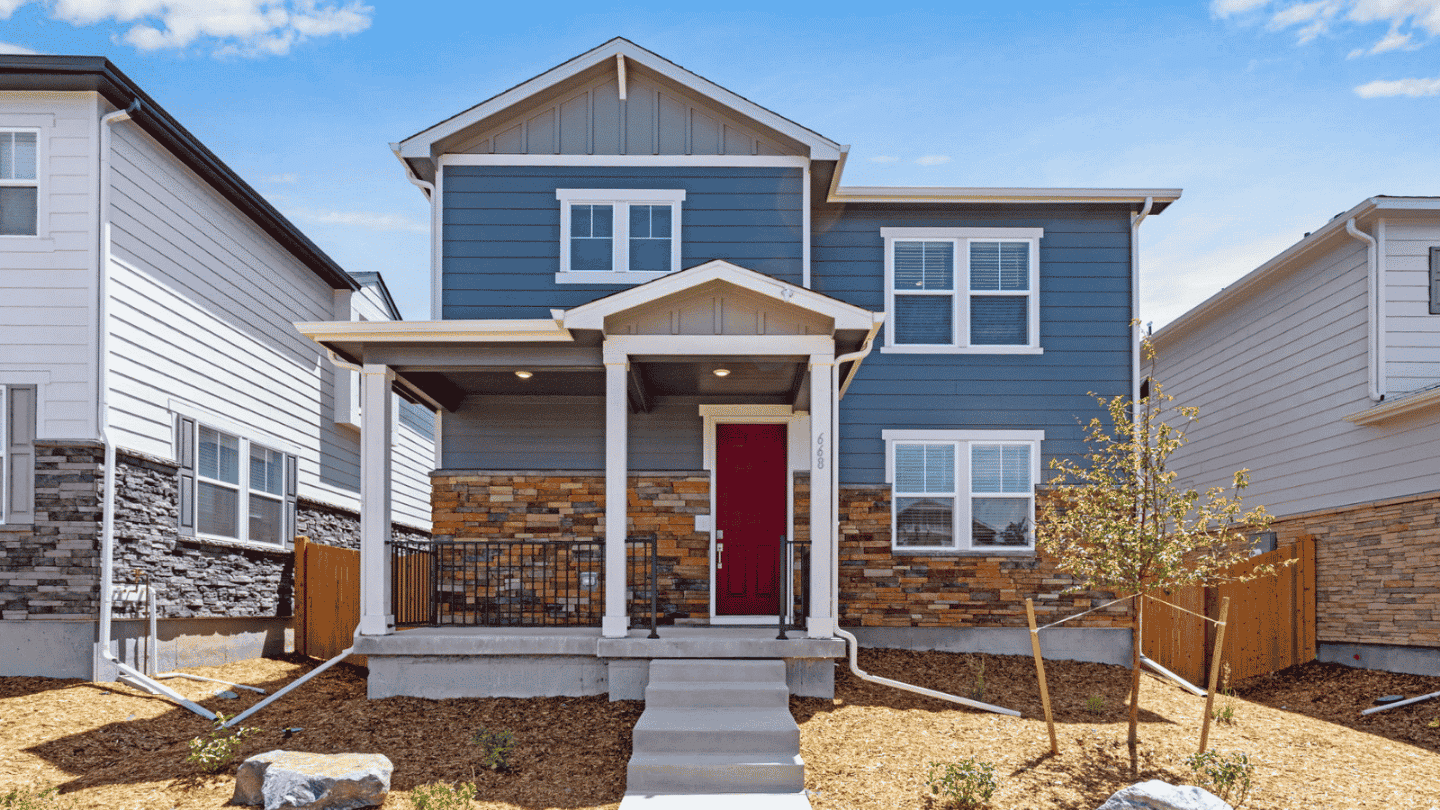 Exterior of two story home in Aurora, Colorado at Horizon Uptown new home community