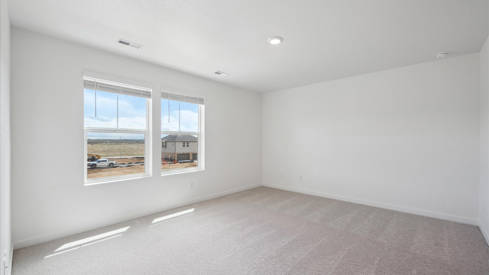 Bedroom in the upstairs of the Alamosa floor plan