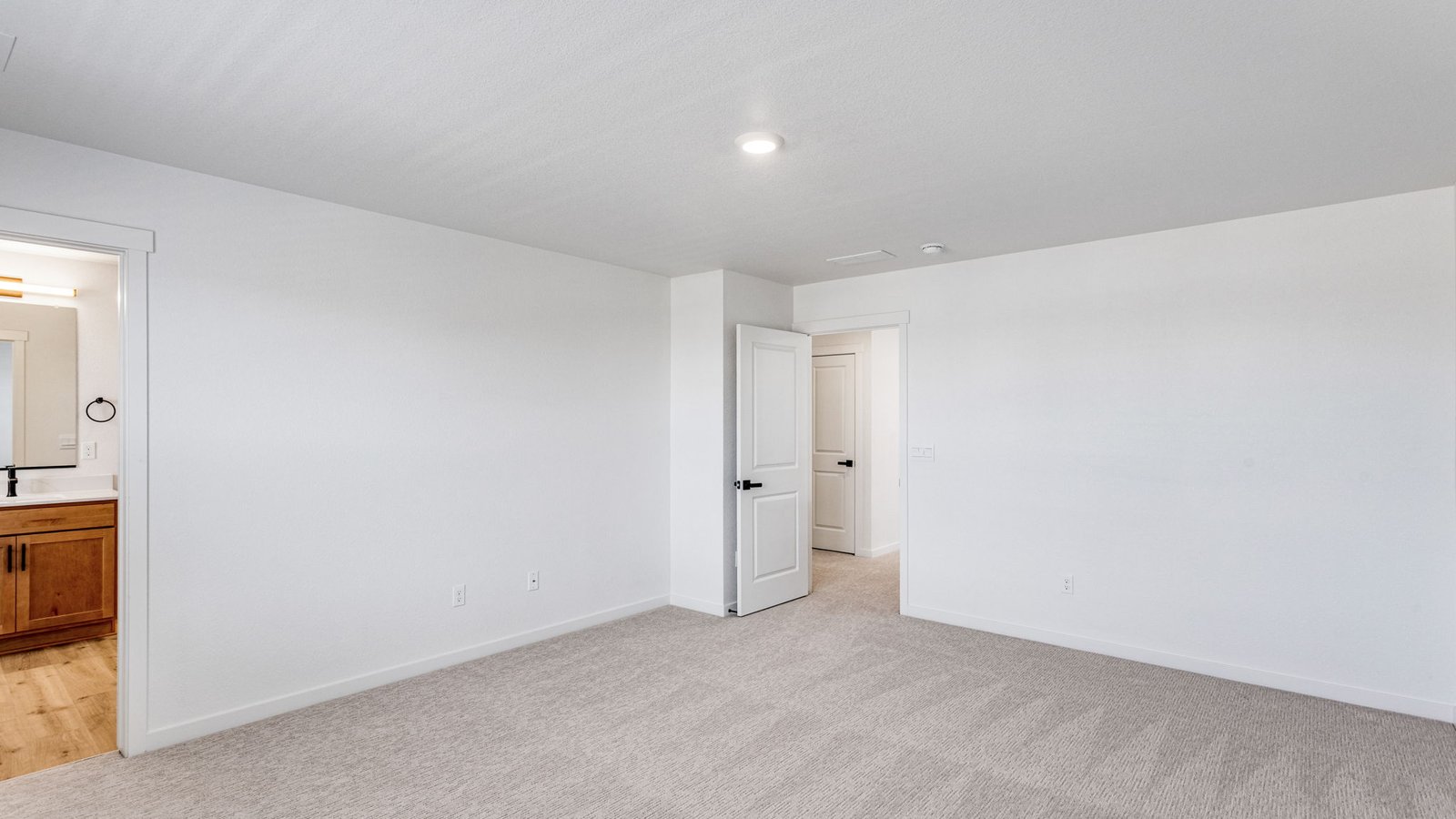 Spacious private primary bedroom in new D.R. Horton home in Aurora, Colorado near DIA