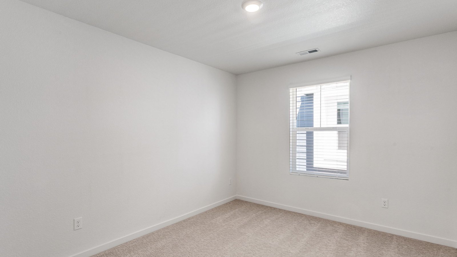 Secondary bedroom space in new home near Aurora, Colorado