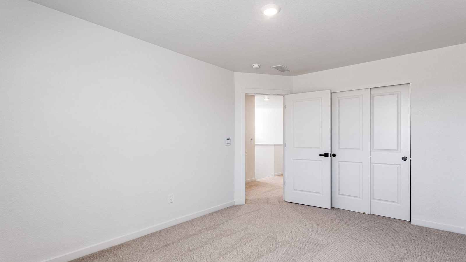 Spacious secondary bedroom in new home at Horizon Uptown