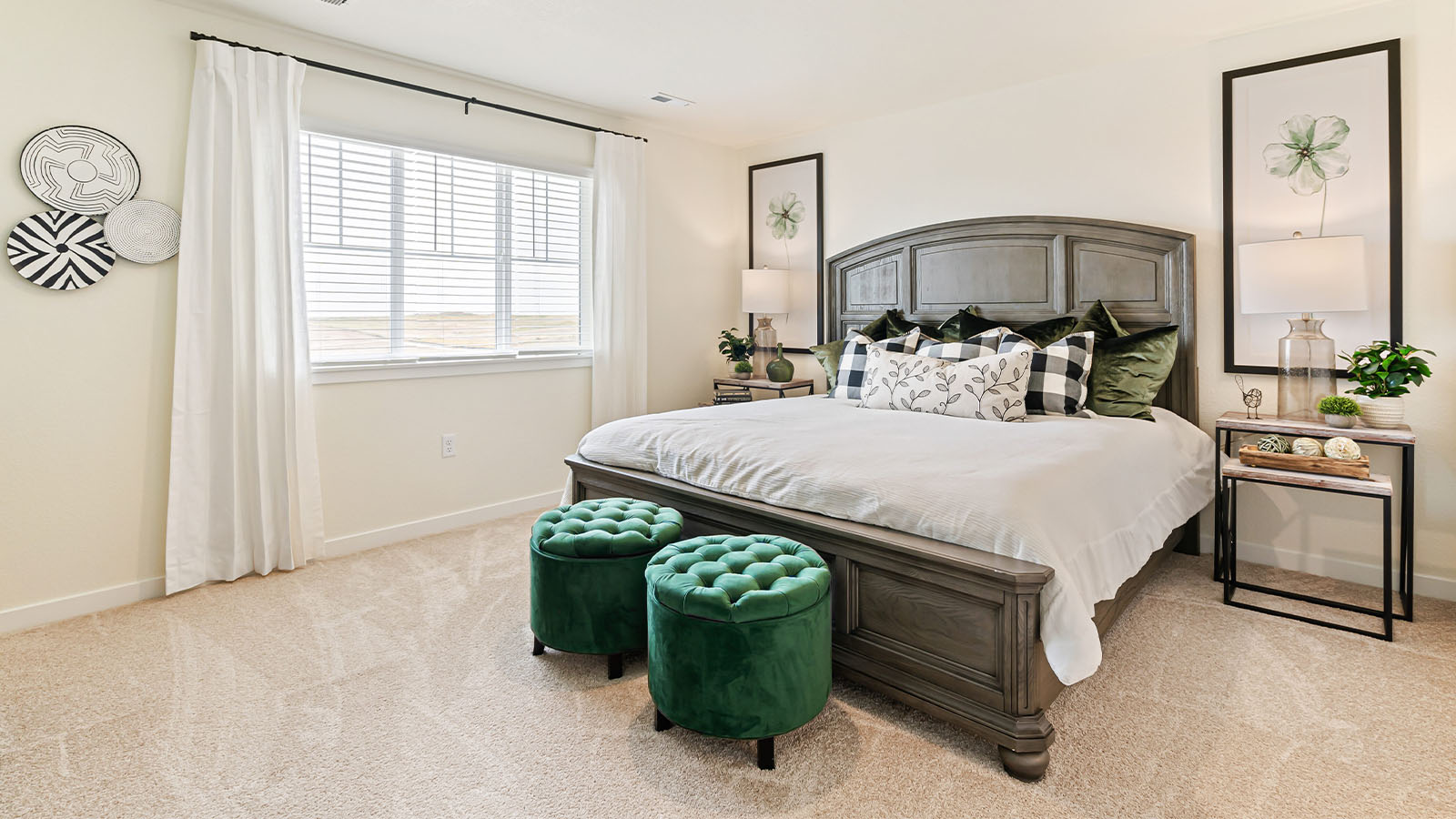 Horizon Uptown model home Primary bedroom features multiple bright windows with sills and decorative grids and plush carpet