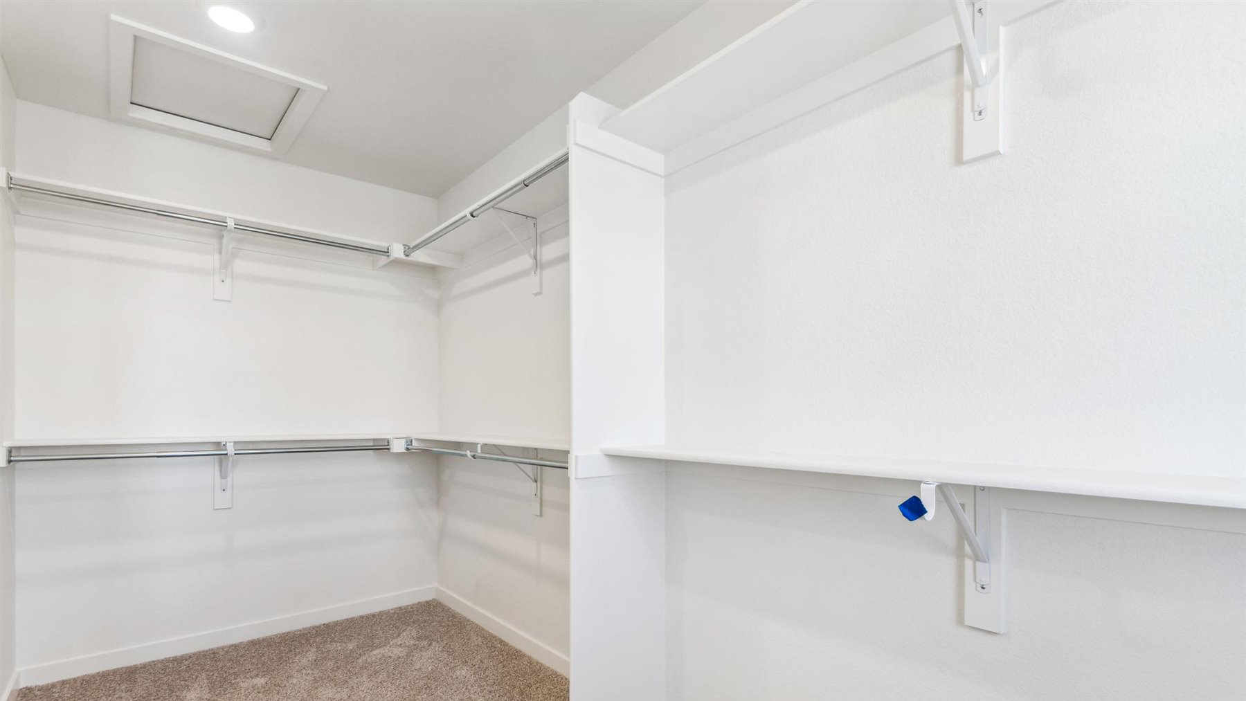 Elbert floor plan at Horizon Uptown provides a large walk-in closet for the primary ensuite with built-in shelving