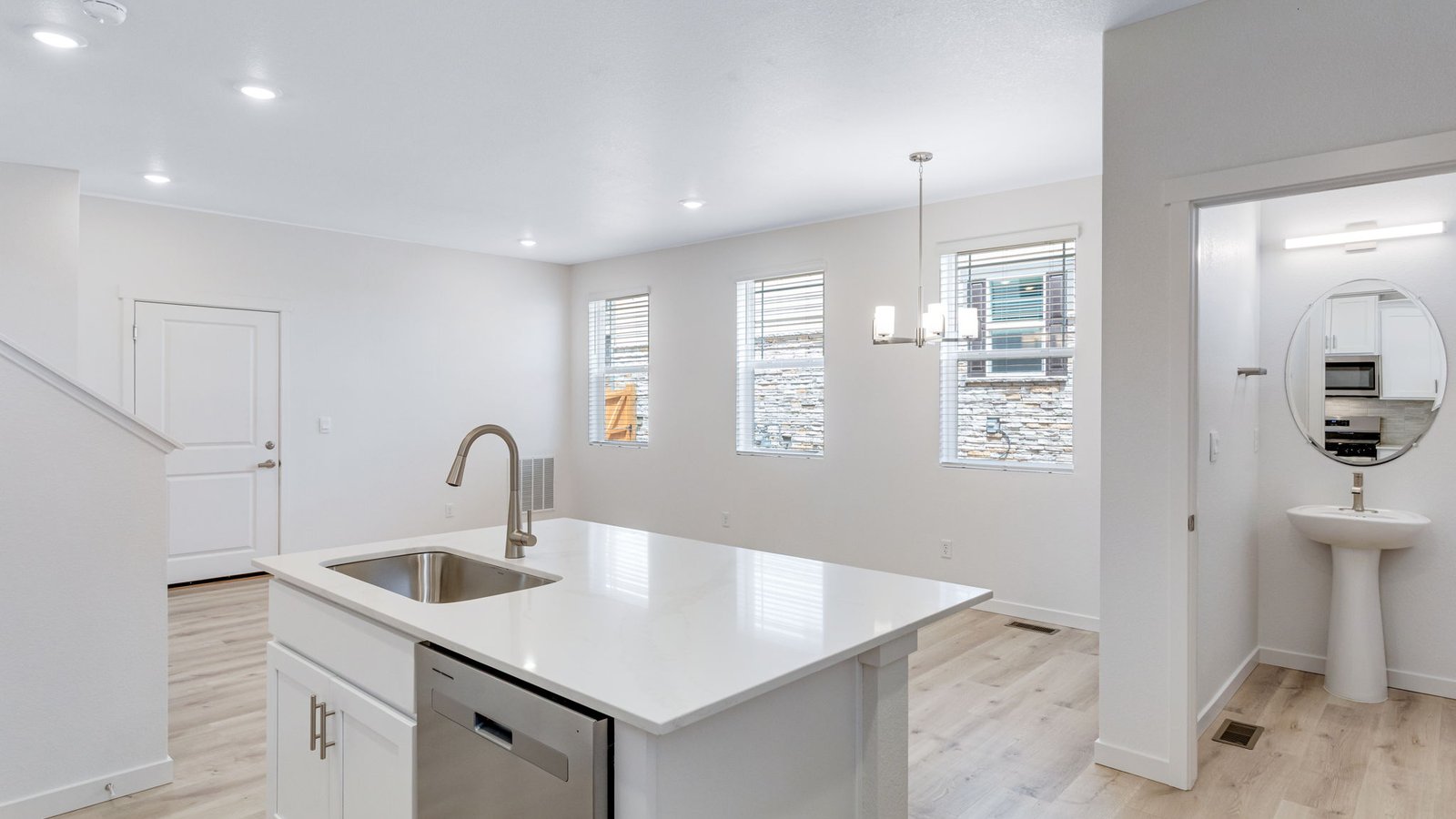 Spacious kitchen island perfect for entertaining in new home in Aurora Colorado
