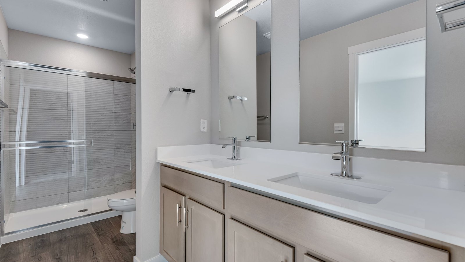 Primary bathroom with two sinks