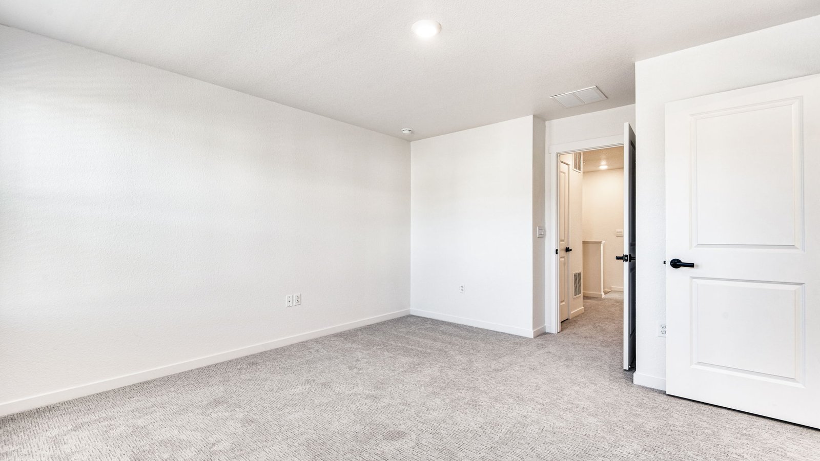 Well-appointed bedrooms offering a balance of comfort and modern style.