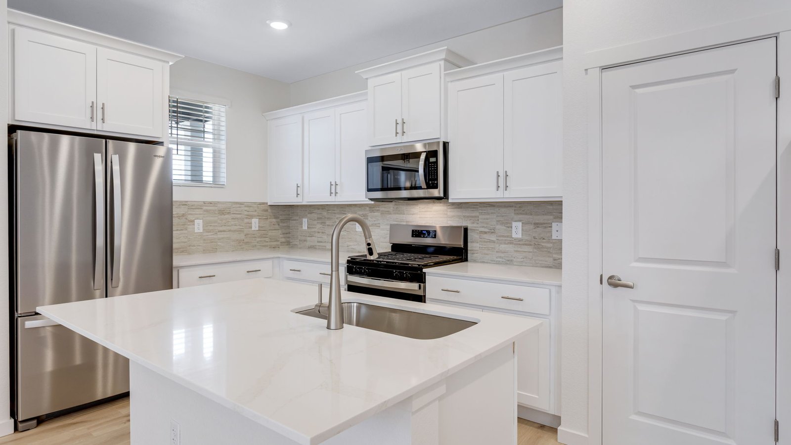 Spacious kitchen with new finished in D.R. Horton new home in Aurora, Colorado