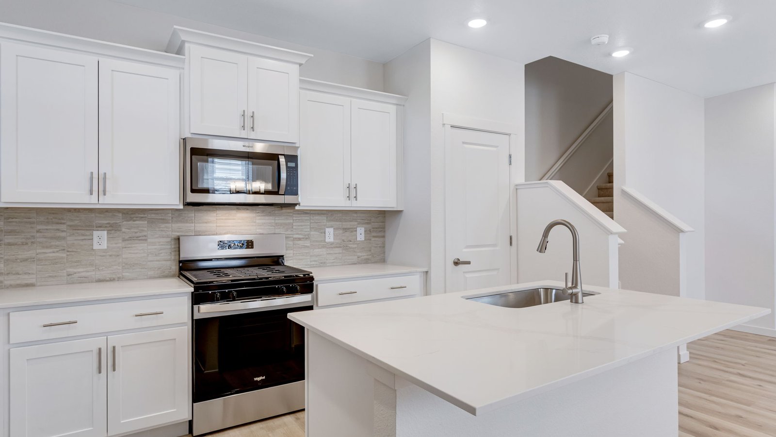 Spacious kitchen island perfect for entertaining in new Aurora, Colorado home