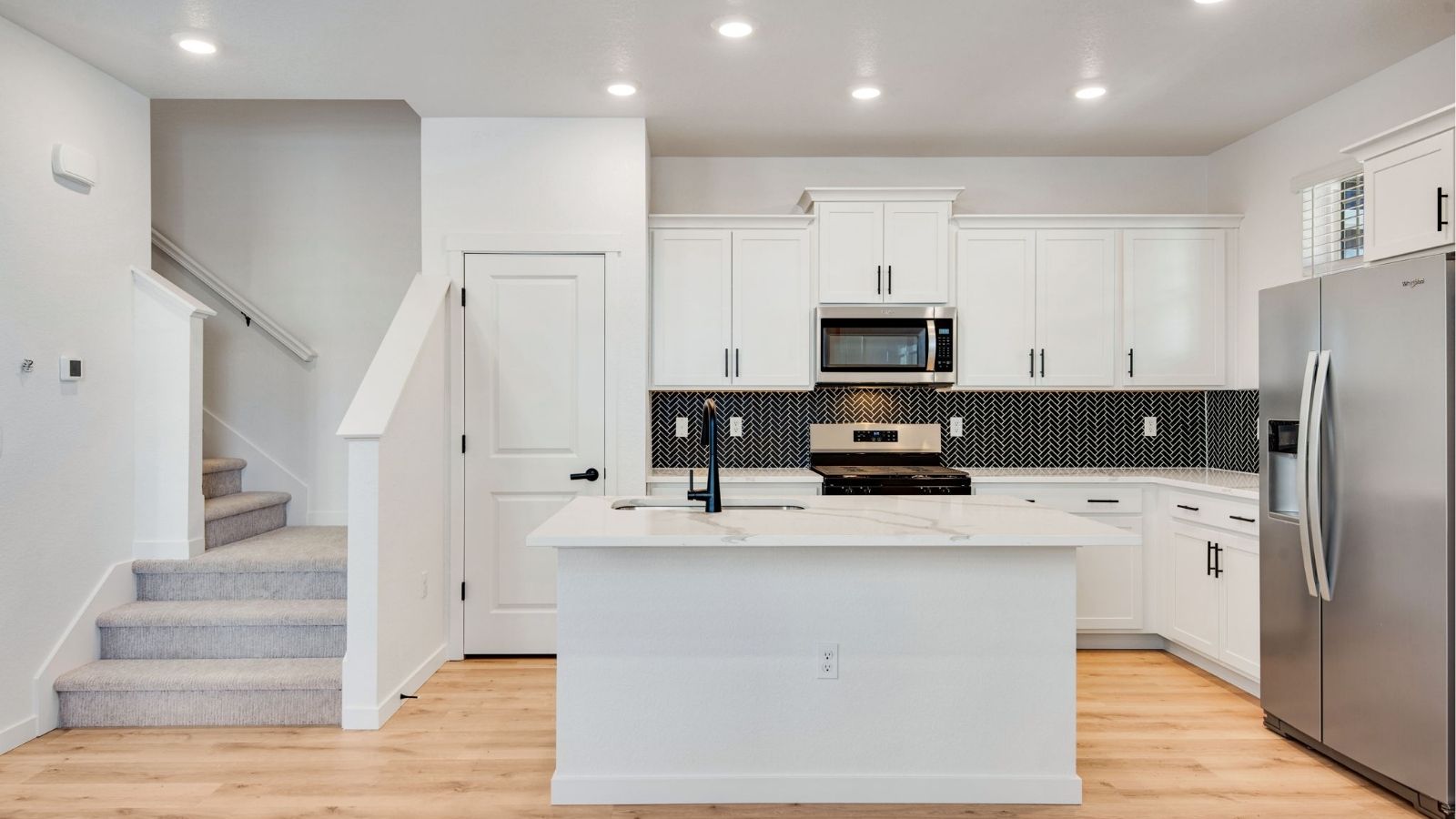 Open‑concept kitchen in Horizon Uptown new home for sale