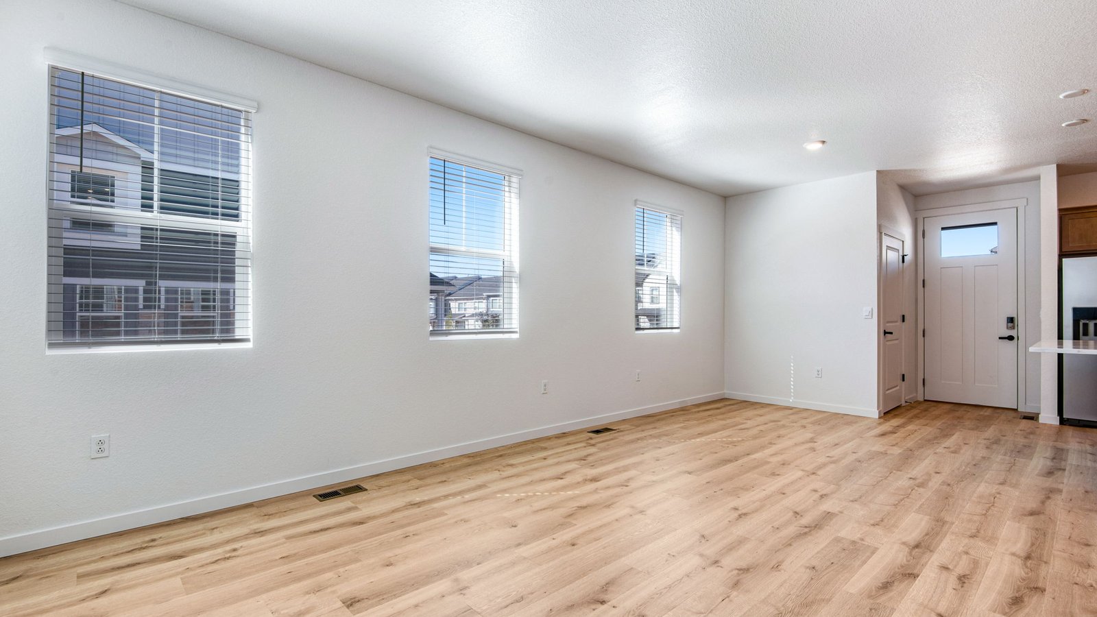 large main floor living space with large windows