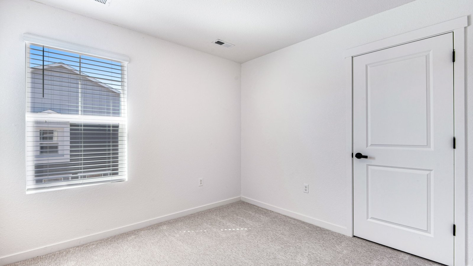 third bedroom in new D.R. HOrton home Aurora, CO