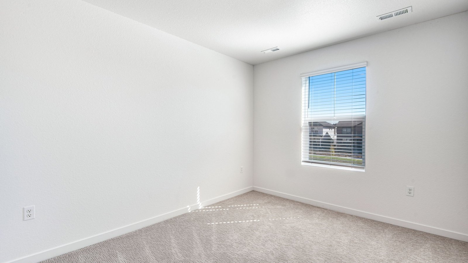 large window in third bedroom of D.R. Horton home Aurora, CO