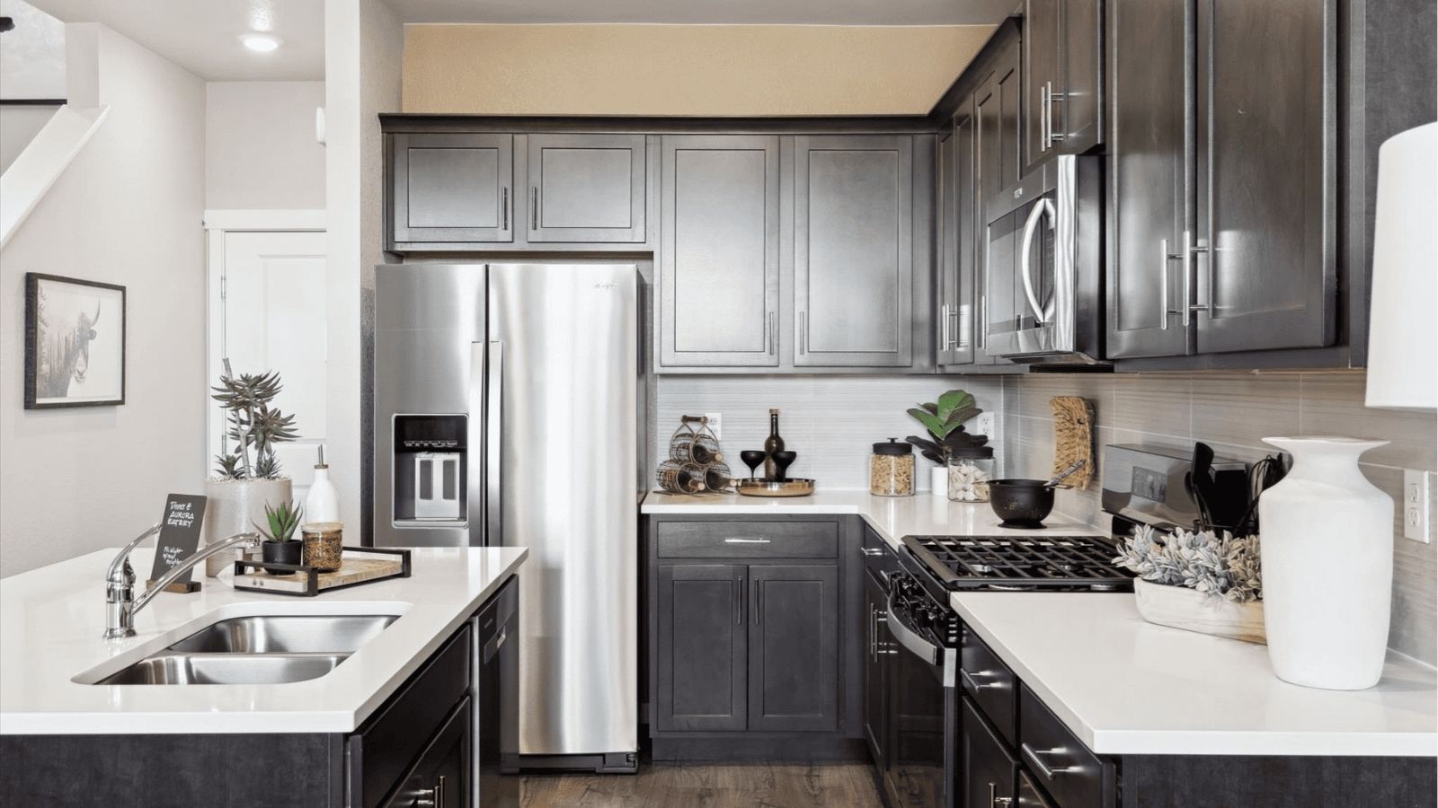 Kitchen with stainless steel appliances and large kitchen island