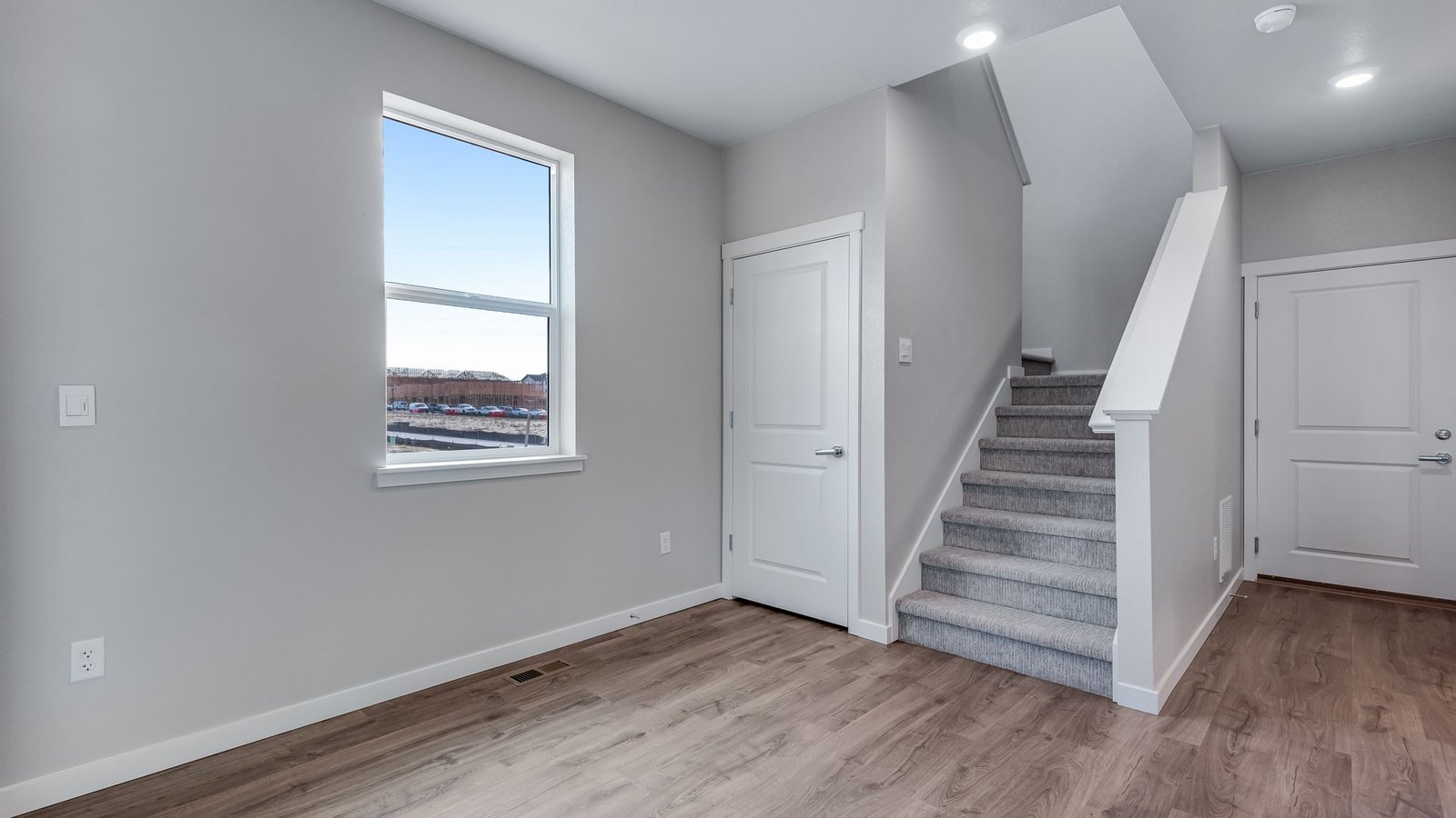 Spacious living room in Melbourne plan connecting to kitchen and dining area