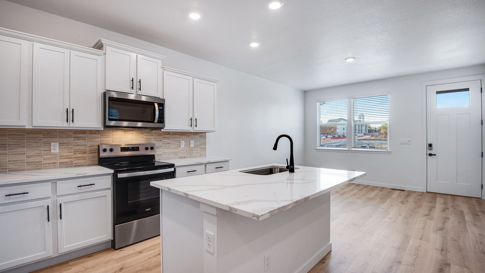 White cabinets in new construction kitchen