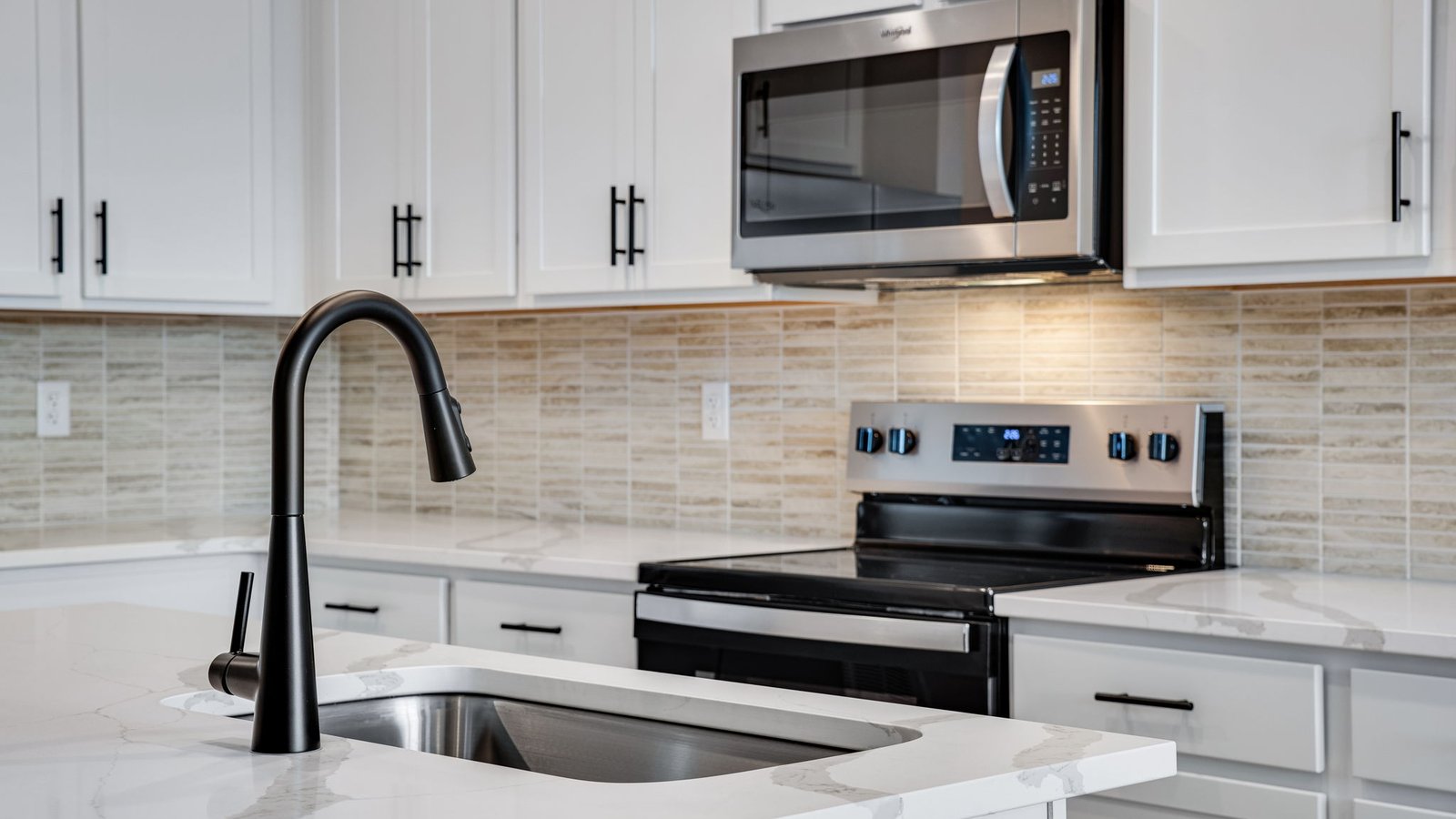 White cabinets in new construction kitchen