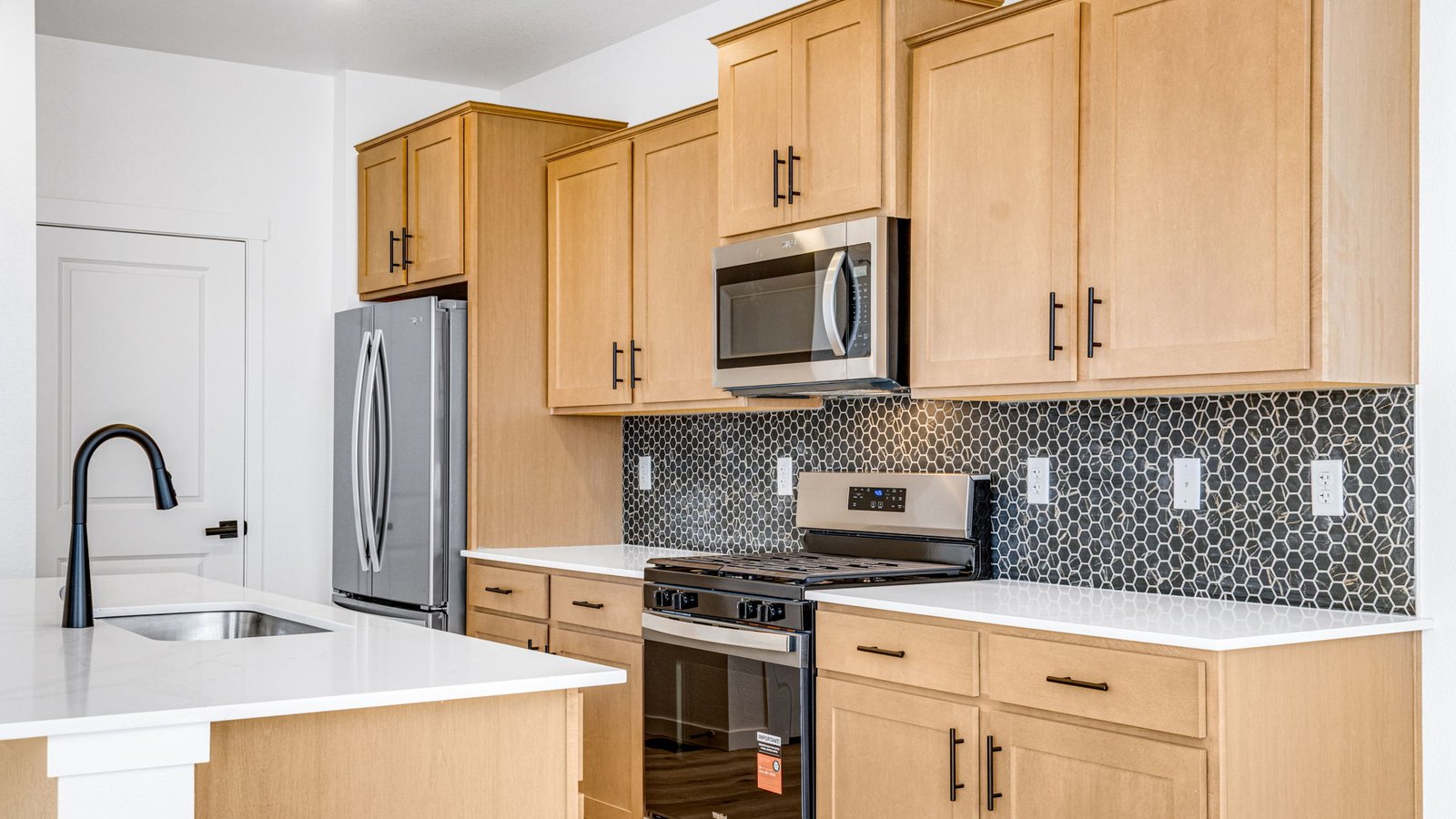 Kitchen with modern new finishes at D.R. Horton home