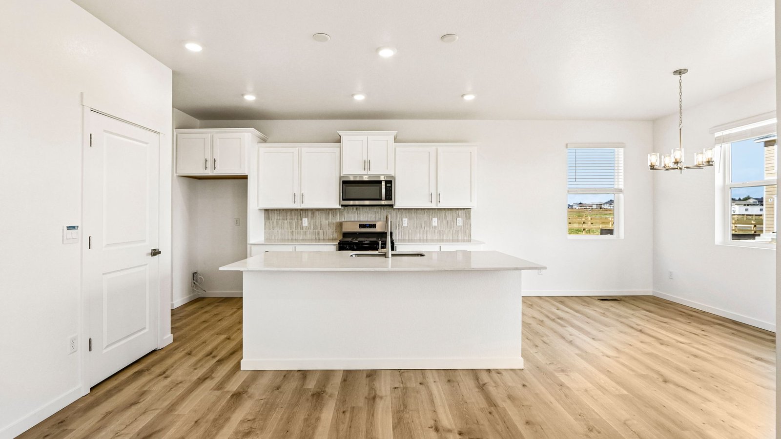Beautiful kitchen designed for cooking and entertaining with generous prep space and cabinetry.